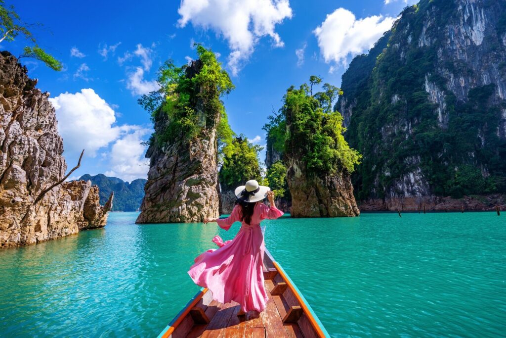 beautiful girl standing boat looking mountains ratchaprapha dam khao sok national park surat thani province thailand 335224 846