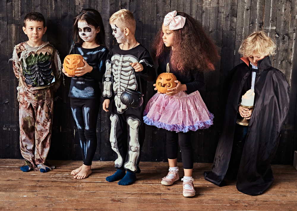 group children costumes halloween party old house halloween concept