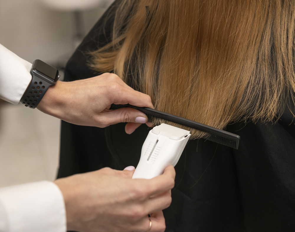 hairdresser styling client s hair salon
