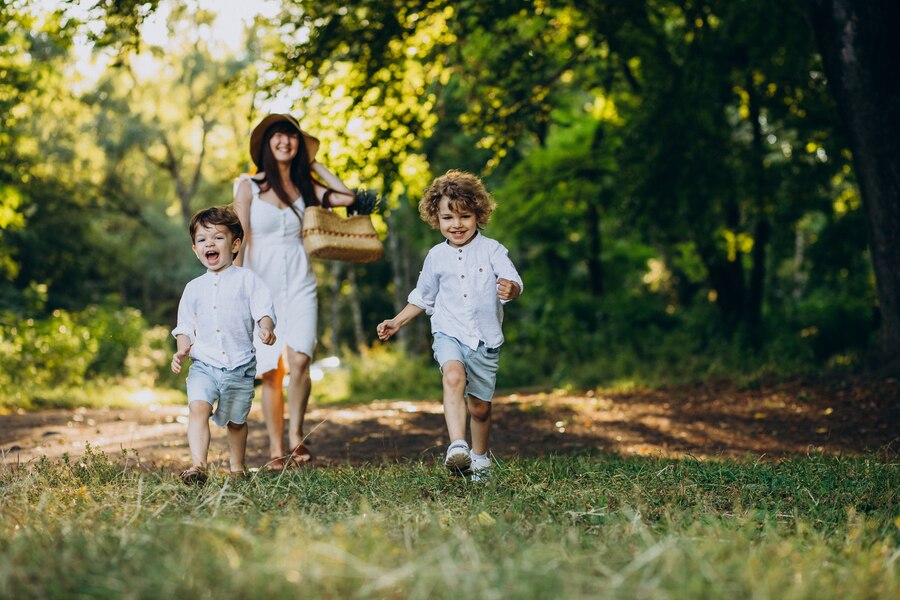 mother with two sons park having fun 1303 24333