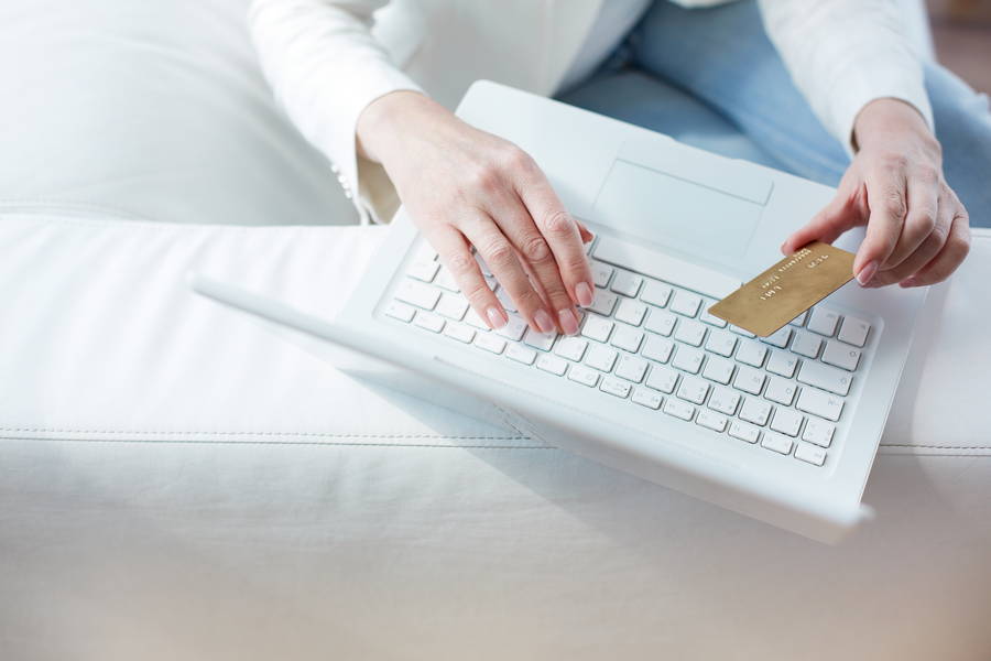 close up female hands making online payment 1